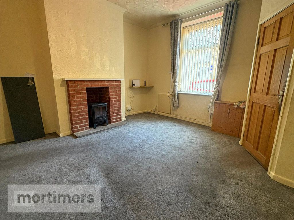 Property photo 2 of 12 Living Room