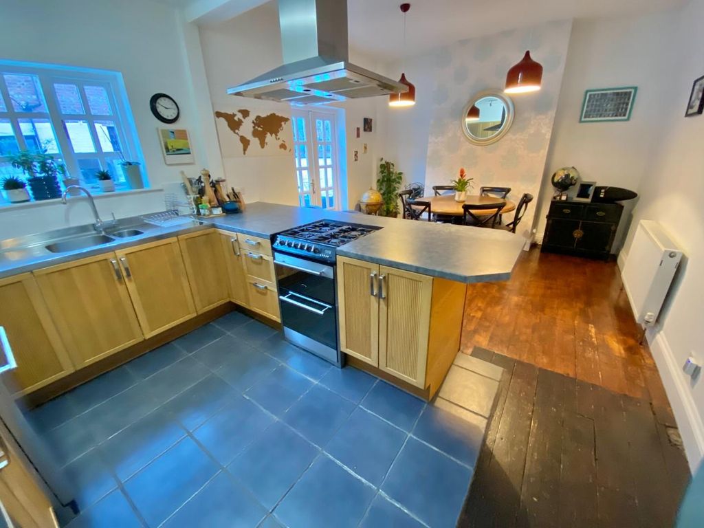Property photo 3 of 16 Dining Kitchen