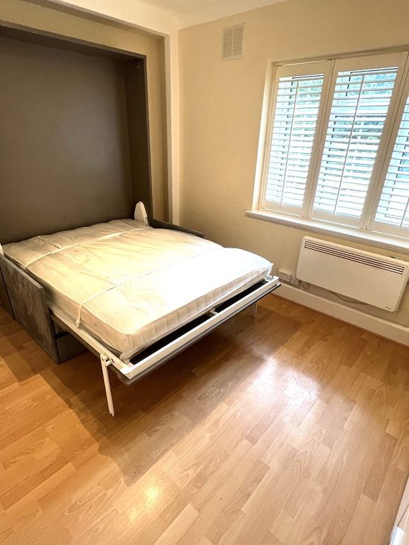 Property photo 3 of 15 Studio Room With Wall Bed