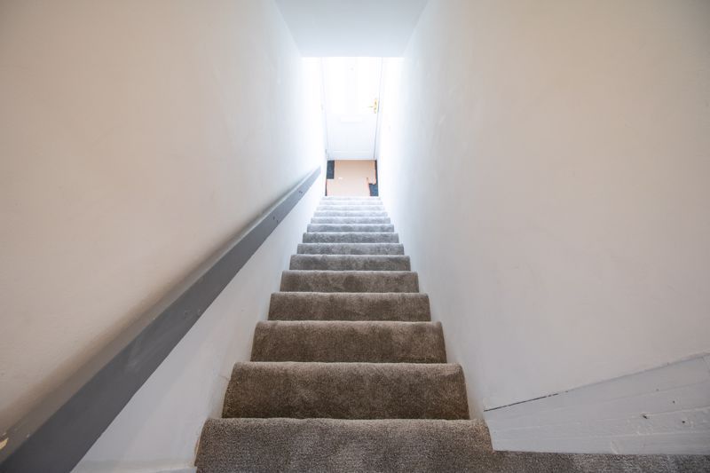 Property photo 2 of 9 Stairwell To The Upper Floor