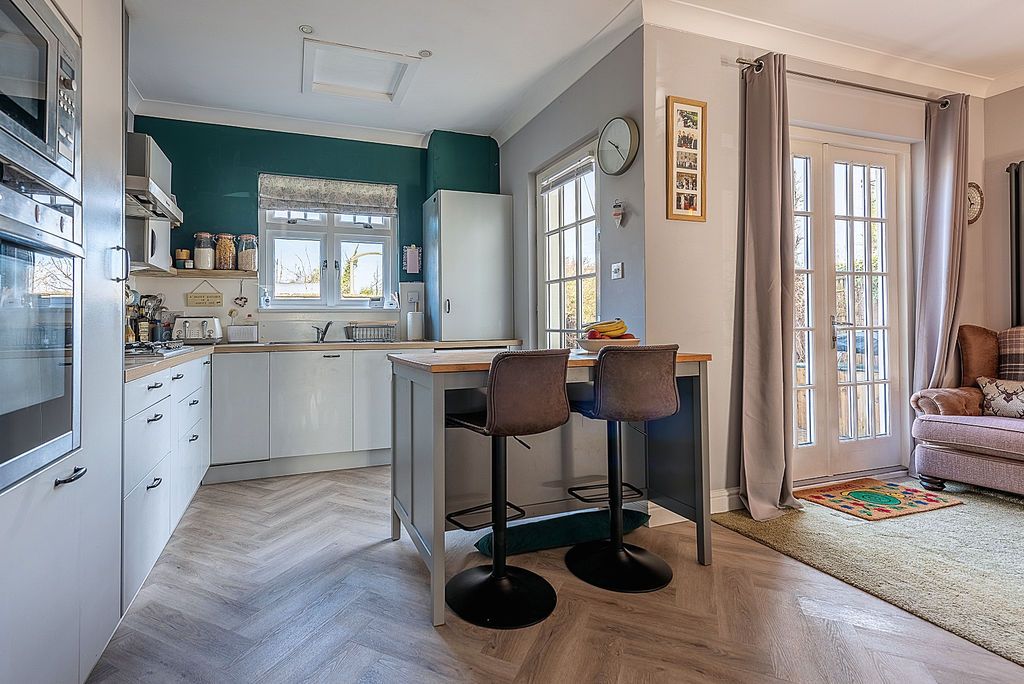 Property photo 3 of 29 Kitchen-Dining Room