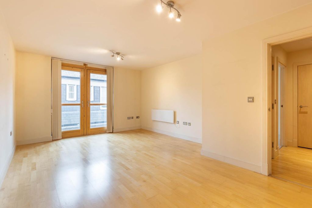 Property photo 1 of 10 Living Area