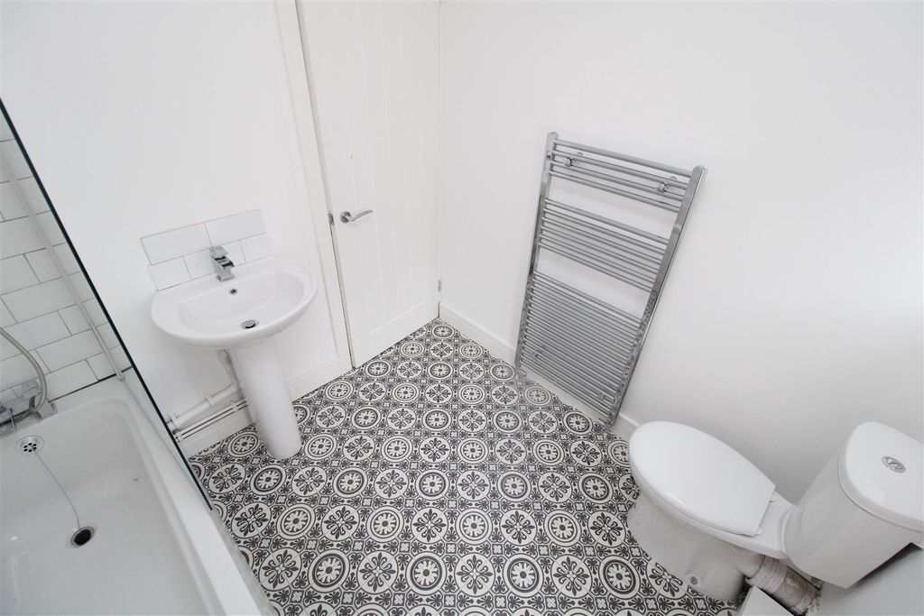 Property photo 2 of 12 Modern Bathroom With Stylish Tiled Flooring...