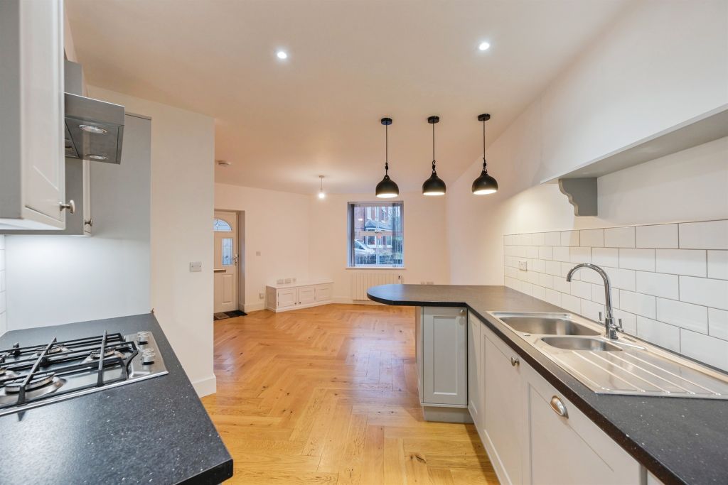 Property photo 3 of 12 Kitchen Area: