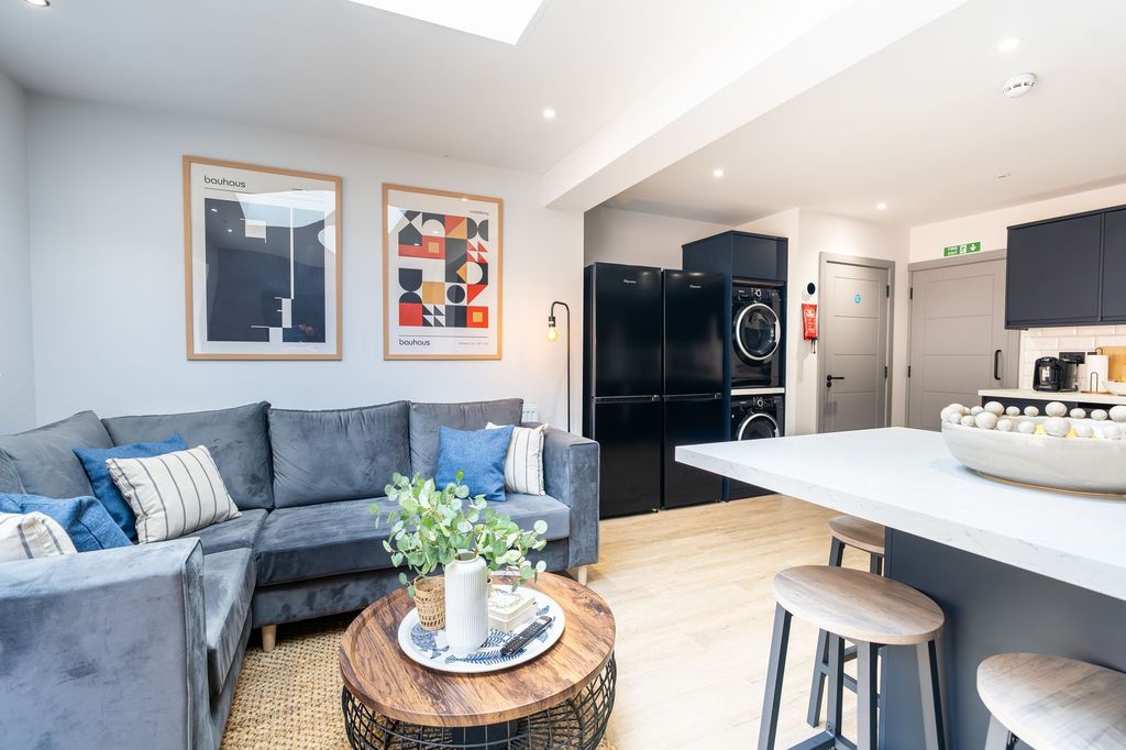 Property photo 3 of 14 Bright And Modern Living Area Featuring A Comforta...