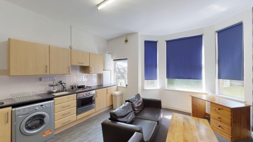 Property photo 3 of 9 A Bright And Tidy Kitchen Featuring Modern Wooden ...