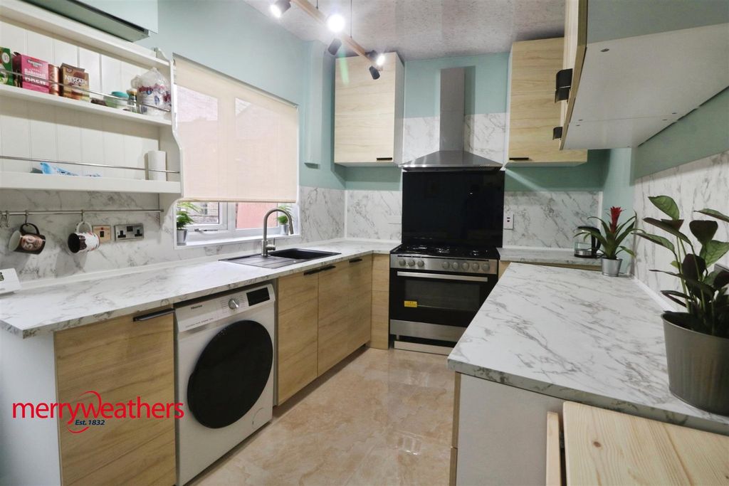 Property photo 1 of 12 Kitchen