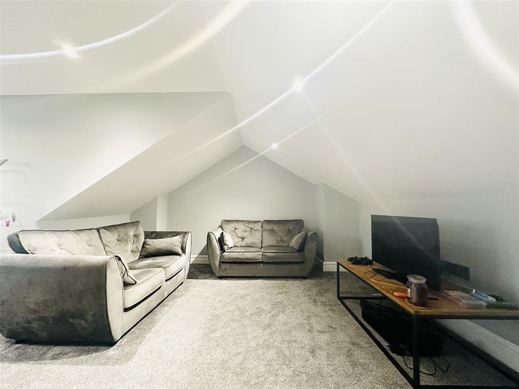 Property photo 1 of 12 Living Area