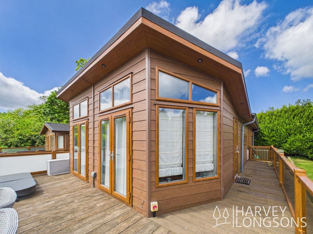 Property photo 1 of 24 Exterior With Decking Of The Prestige Glasshouse Holiday Lodge At Plas Coch Country &amp; Leisure Retreat, Wales