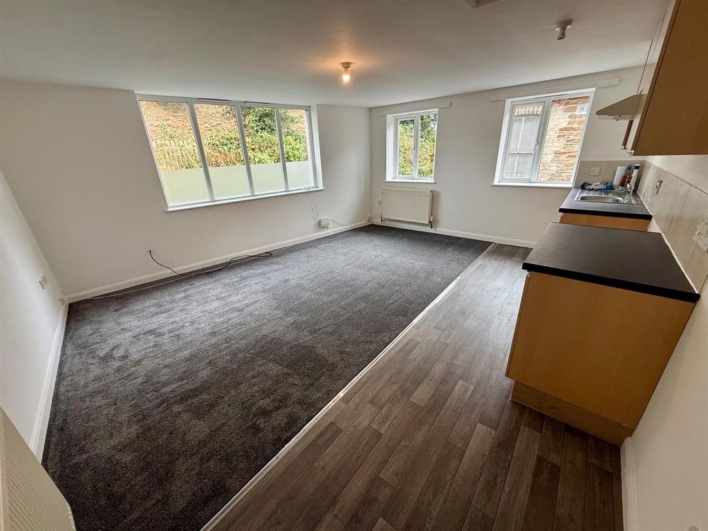 Property photo 3 of 8 Kitchen Living Area