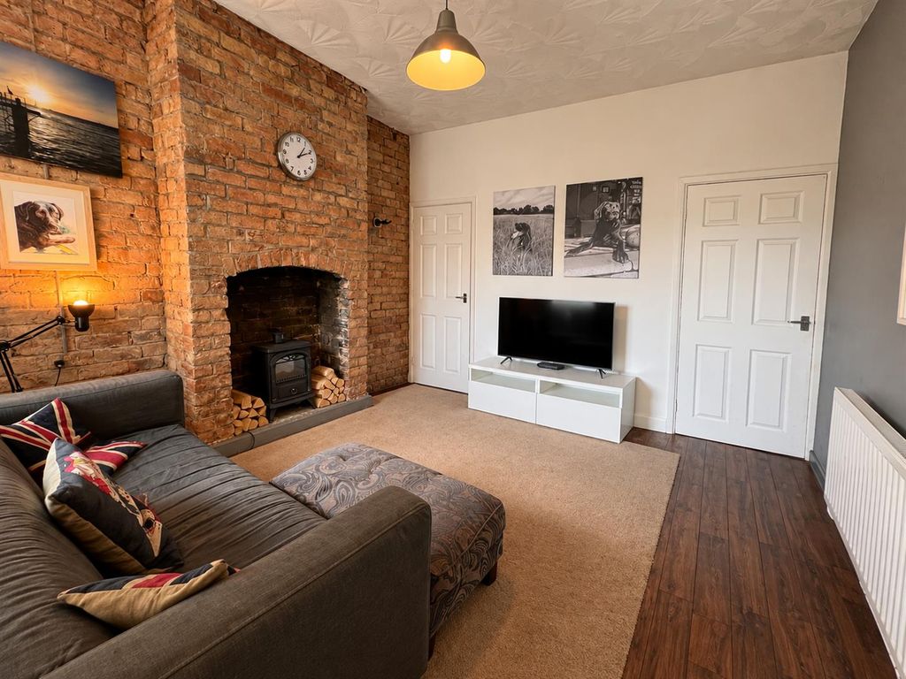 Property photo 3 of 12 Living Room
