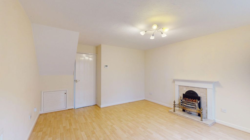 Property photo 3 of 11 Living Room - Angle 2