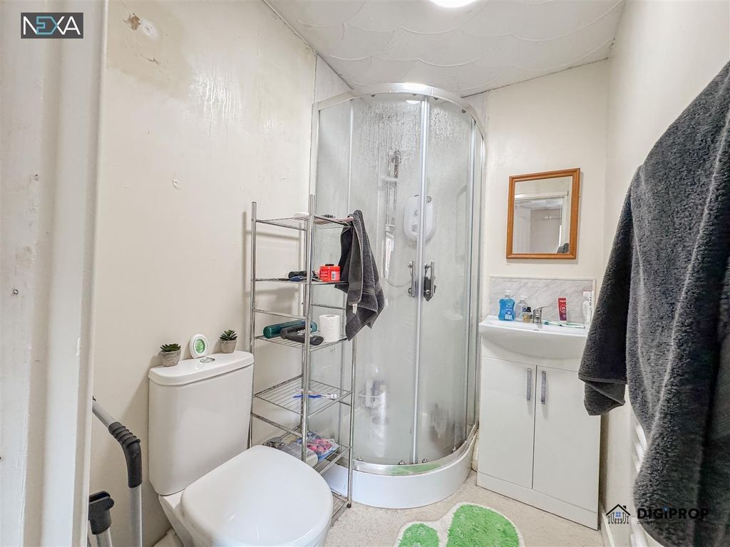 Property photo 3 of 14 Bright Bathroom With Modern Corner Shower Suite...