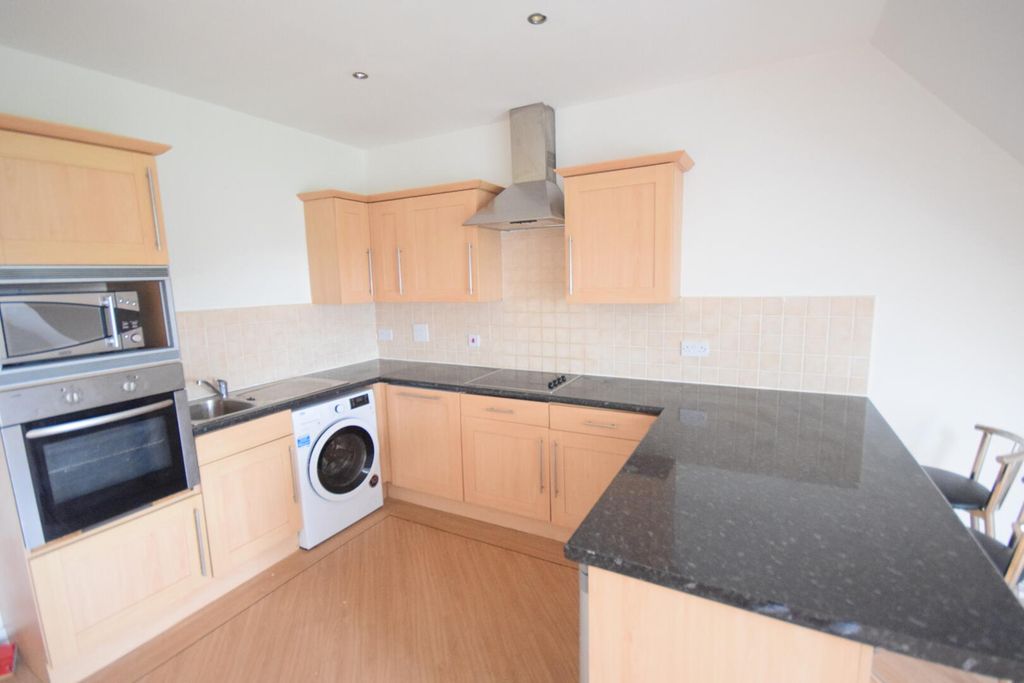 Property photo 2 of 9 Kitchen