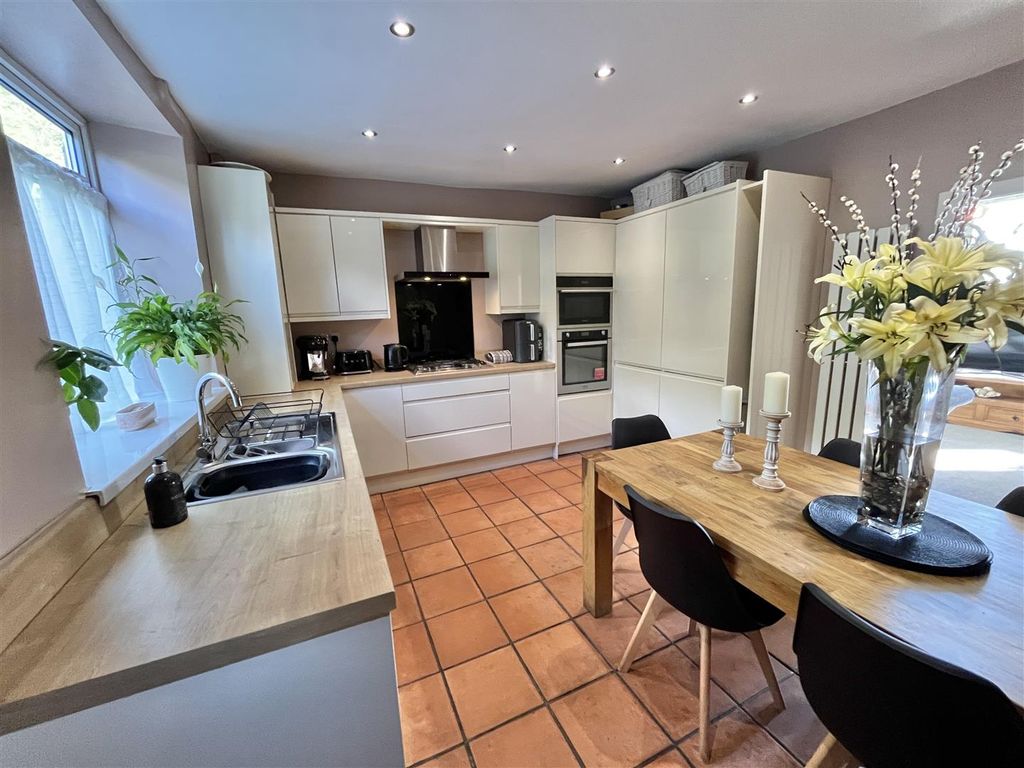 Property photo 3 of 13 Dining Kitchen