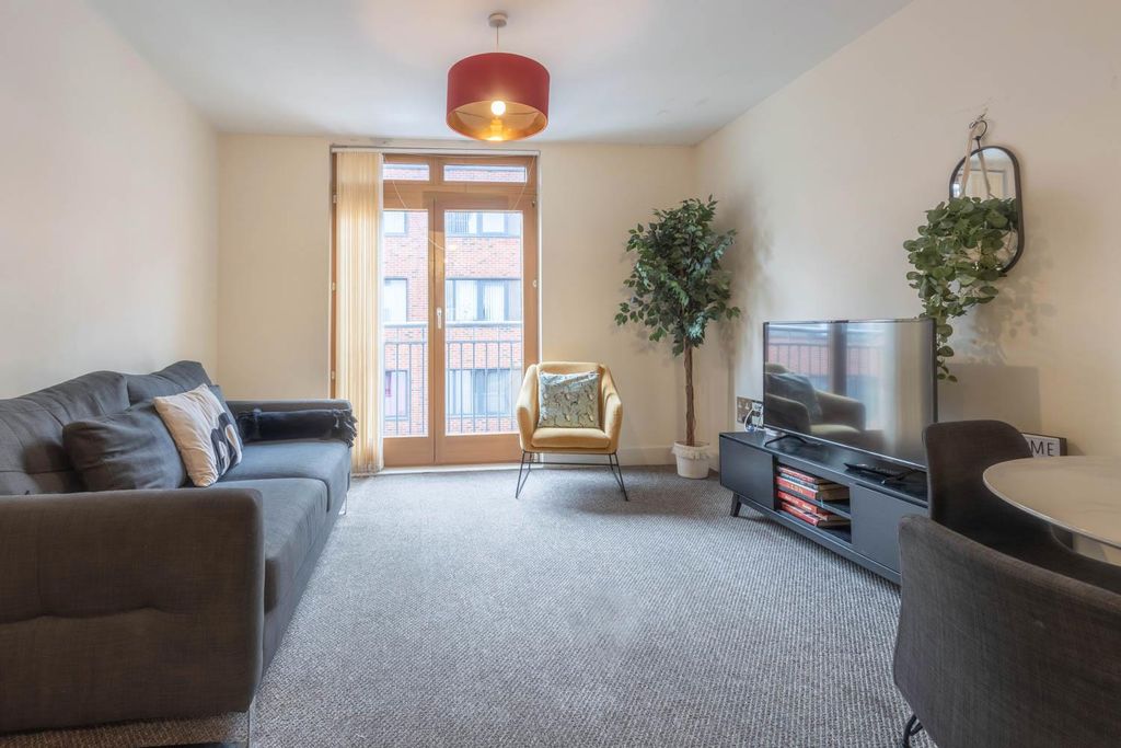 Property photo 1 of 10 Living Area