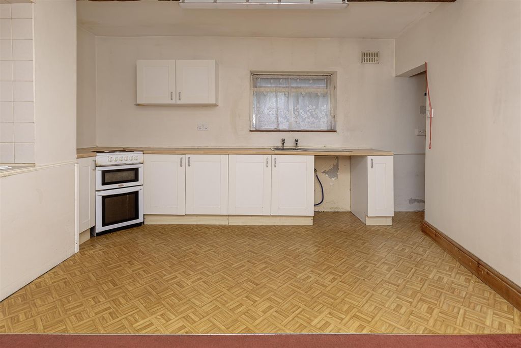 Property photo 3 of 17 Dining Kitchen