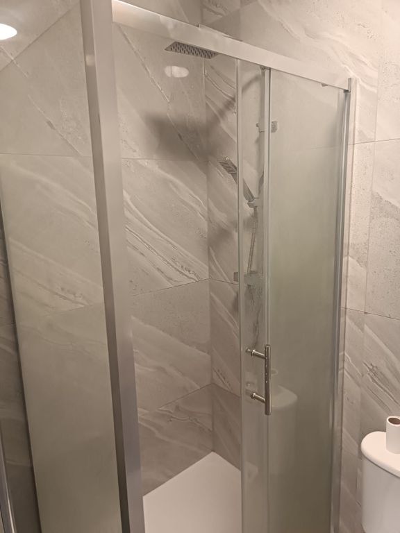 Property photo 3 of 4 Modern Walk-In Shower With Sleek Marble Tiling...