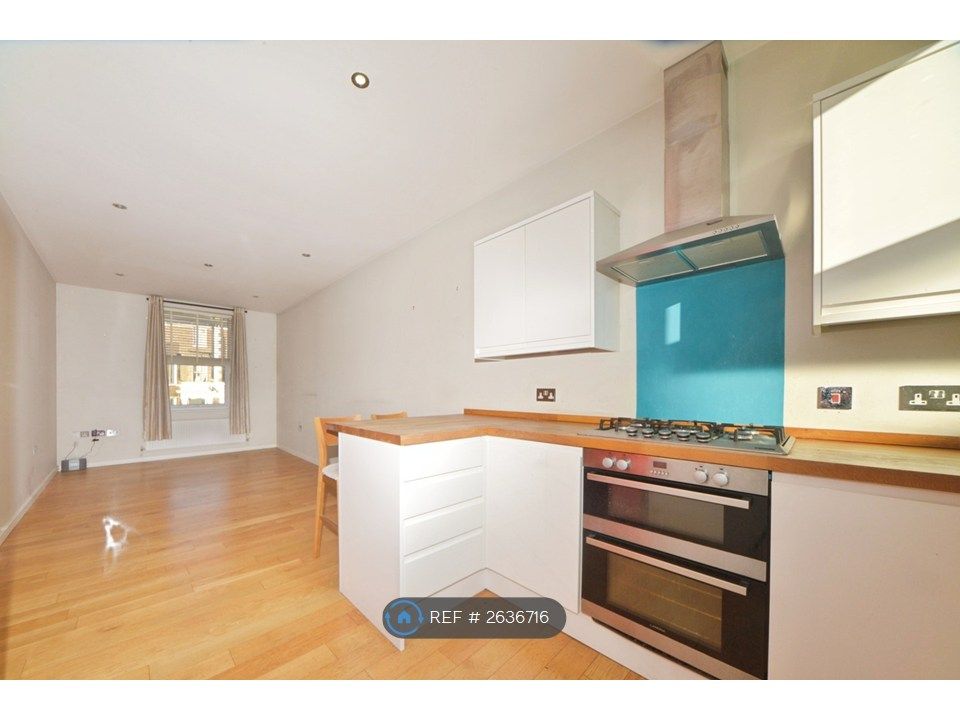 Property photo 3 of 17 Dining Kitchen