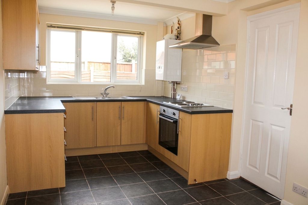 Property photo 3 of 12 Kitchen
