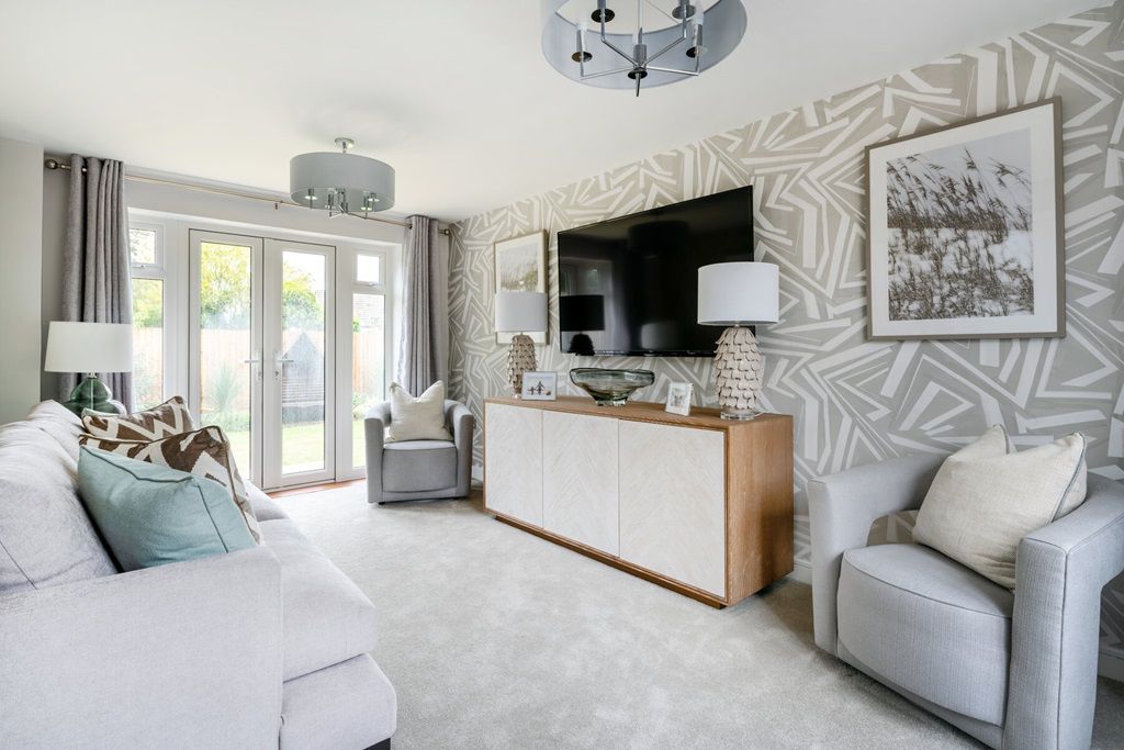 Property photo 2 of 11 A Bright And Airy Living Room With French Doors To The Garden