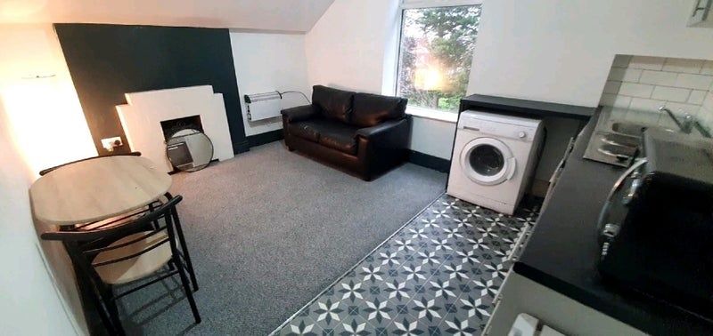 Property photo 2 of 4 Bright Studio-Style Living Space With A Comfy Blac...