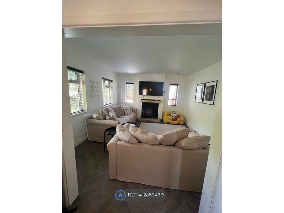 Property photo 1 of 12 Living Area