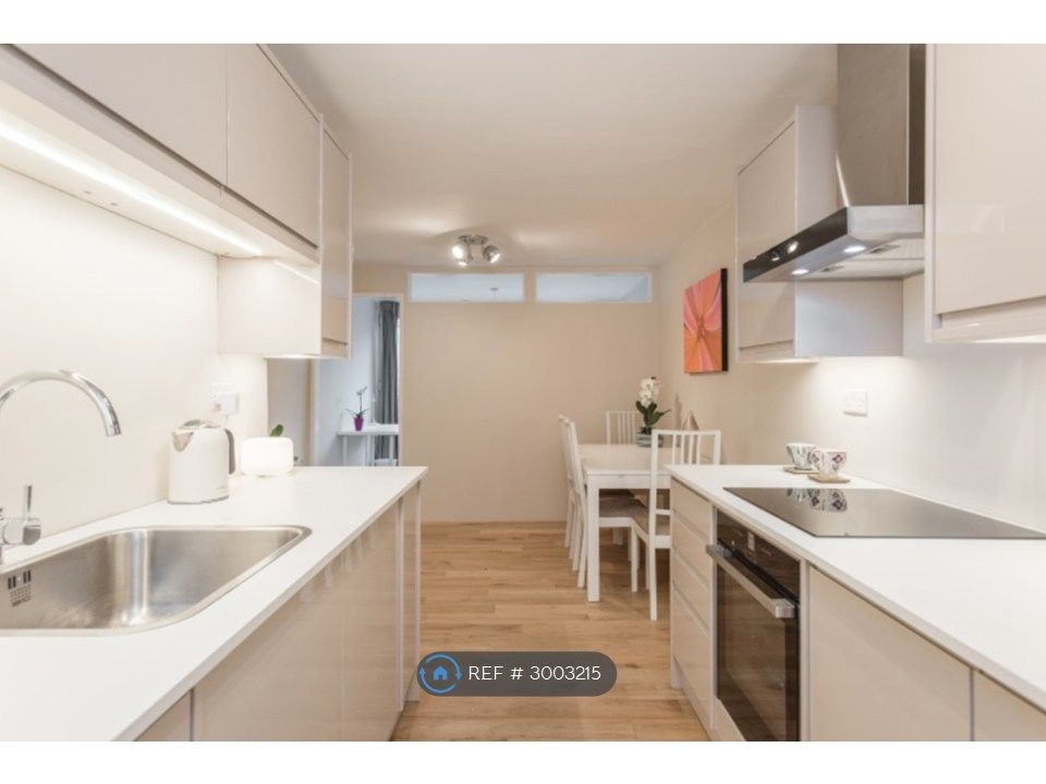 Property photo 1 of 7 Kitchen Overlooking Dining Area