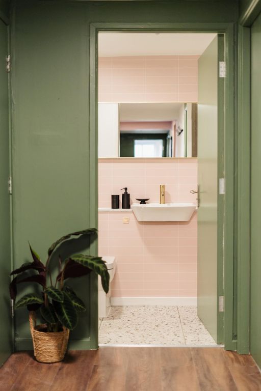 Property photo 3 of 24 A Stylish And Bright Bathroom With Soft Pink Tiles...