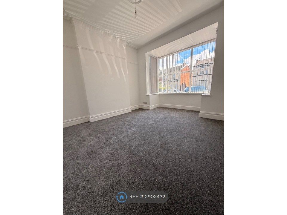 Property photo 3 of 17 Front Living Room