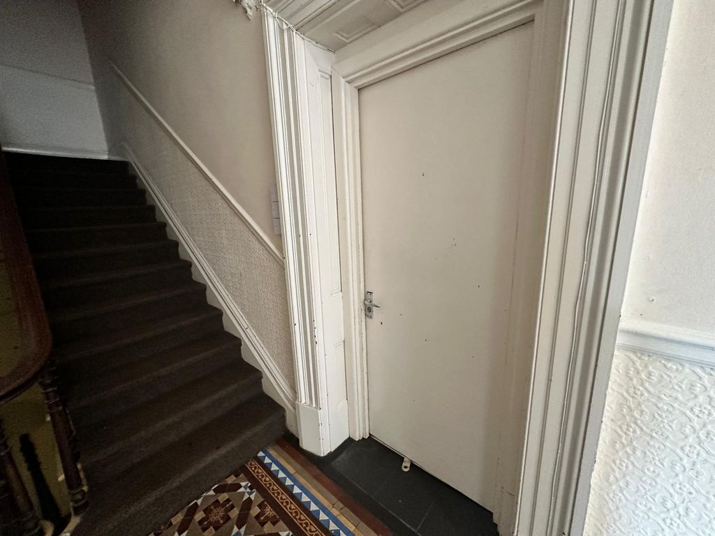 Property photo 1 of 15 A Well-Maintained Hallway With Charming Architectu...