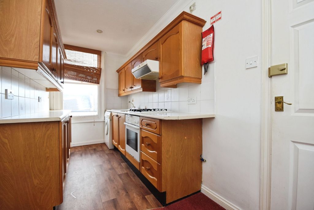 Property photo 2 of 12 Kitchen