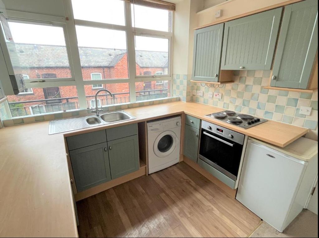 Property photo 3 of 7 Kitchen