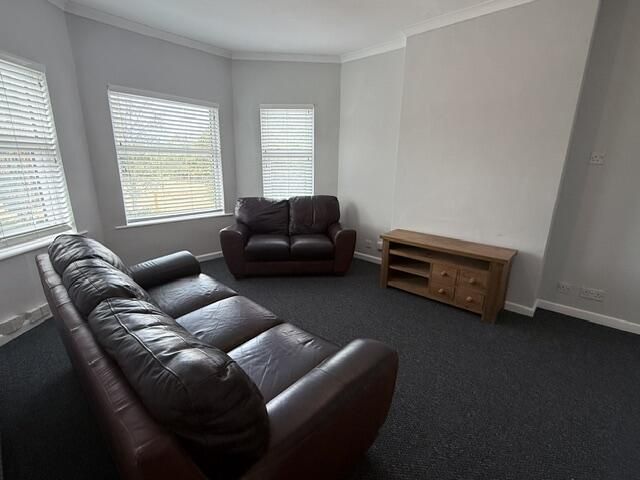 Property photo 1 of 8 Living Room