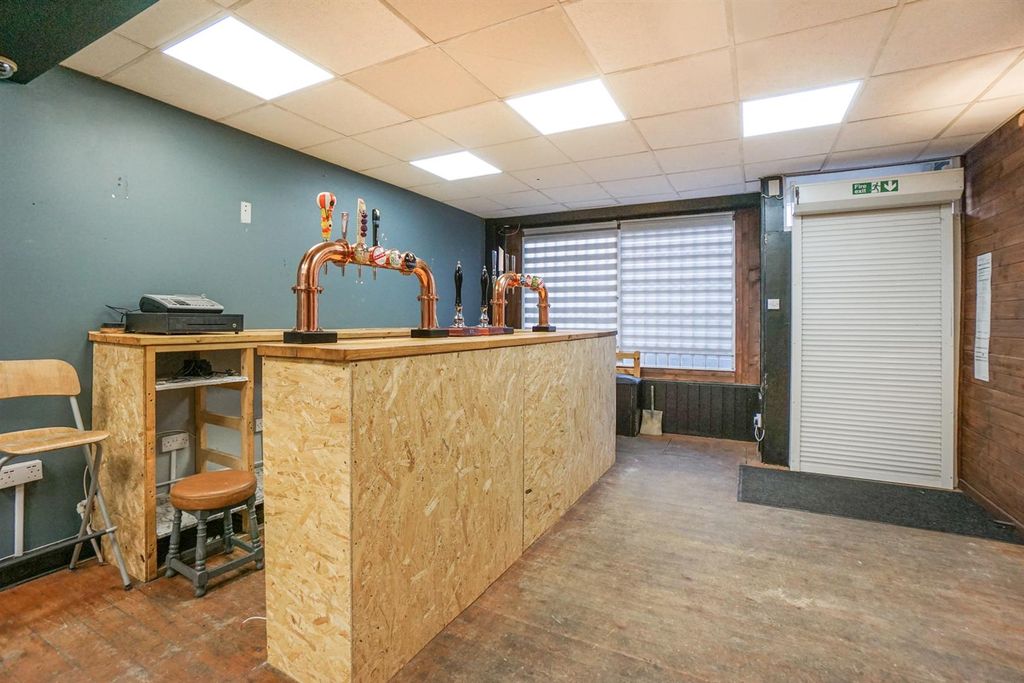 Property photo 2 of 11 Bar Area