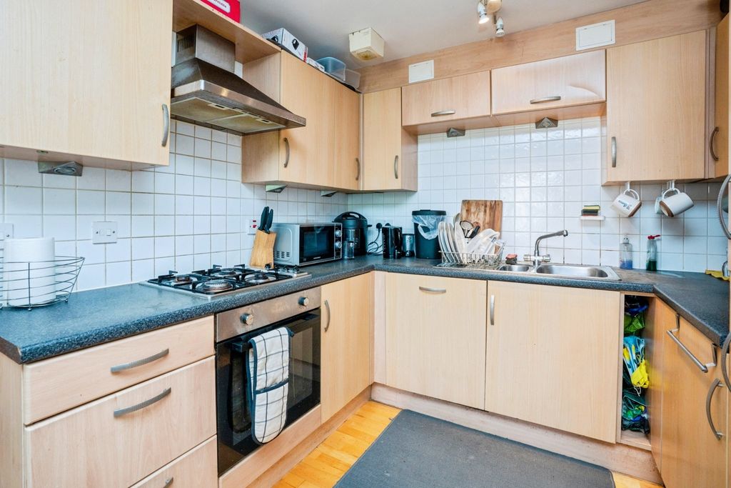 Property photo 3 of 12 Kitchen