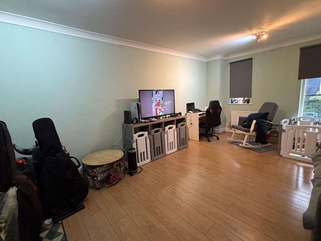 Property photo 1 of 13 Living Area