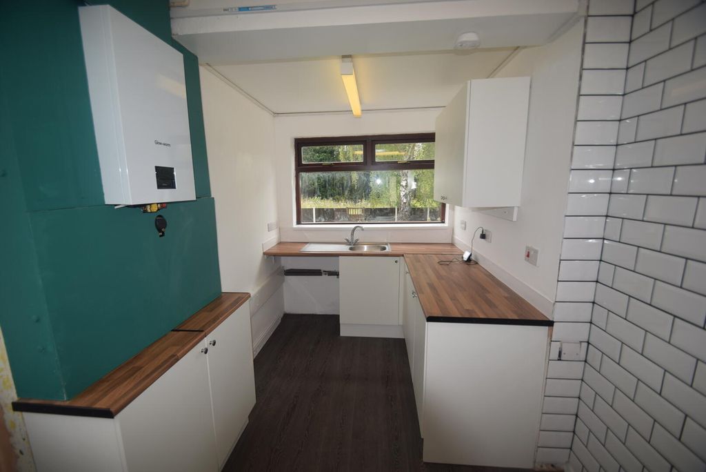 Property photo 3 of 11 Kitchen