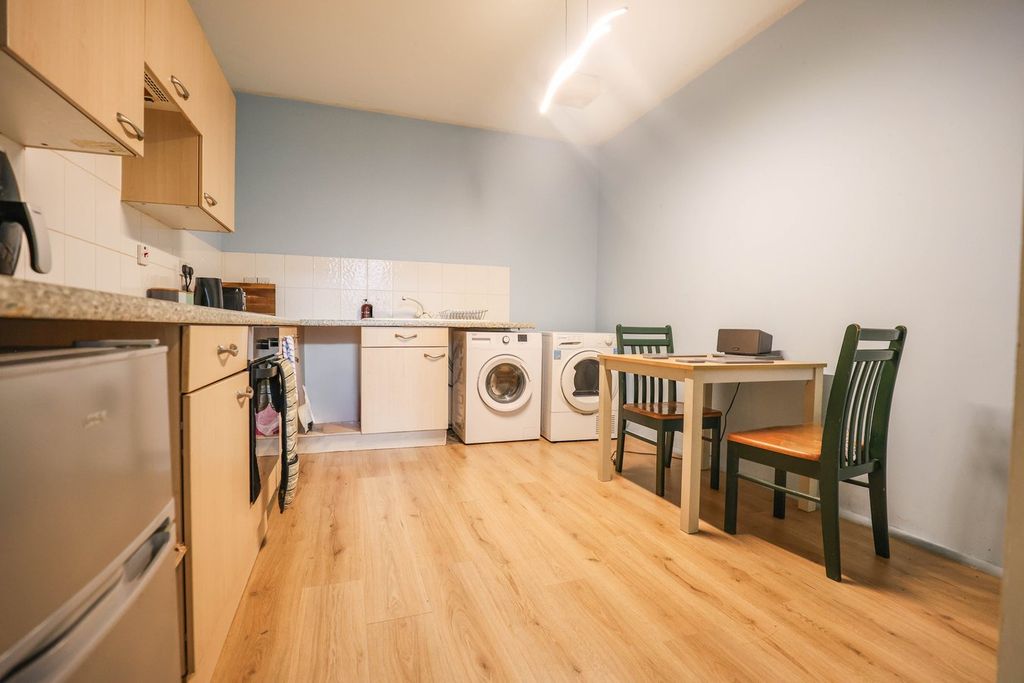 Property photo 3 of 8 Dining Kitchen