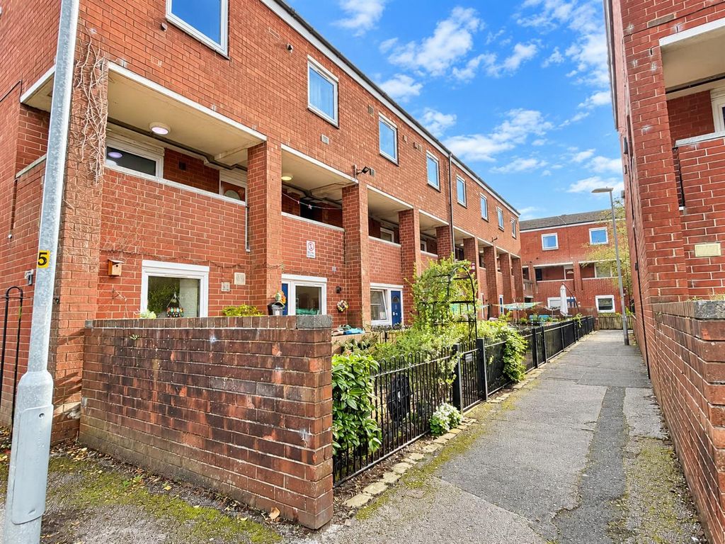 Property photo 2 of 14 Red-Brick Courtyard Walkway In Blue Skies.Png