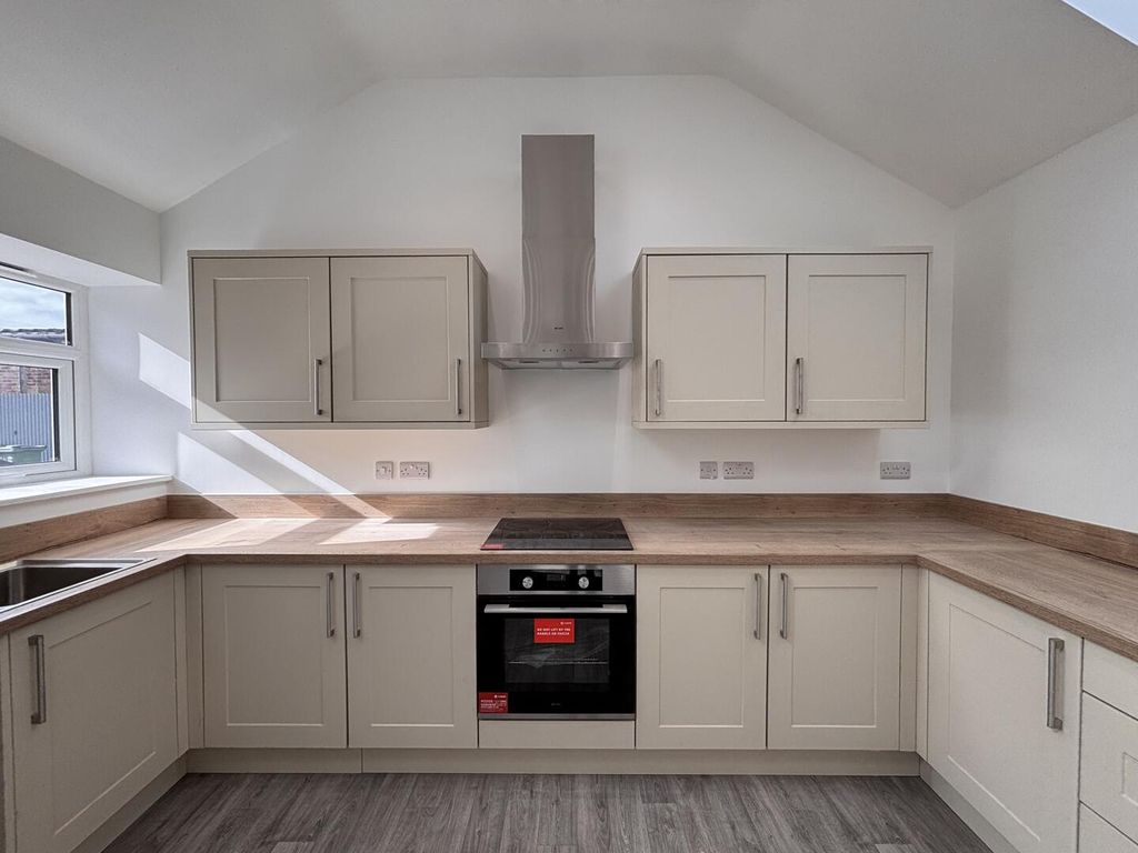 Property photo 3 of 12 Kitchen