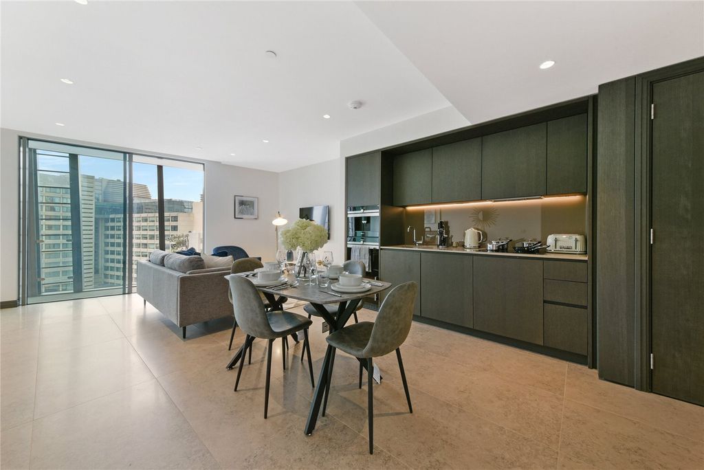 Property photo 1 of 9 Living Area