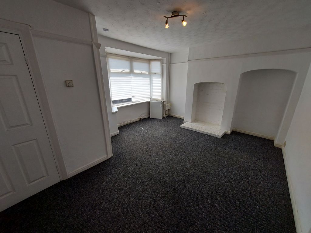Property photo 2 of 8 Living Room
