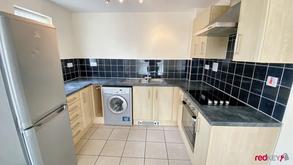 Property photo 3 of 6 Kitchen