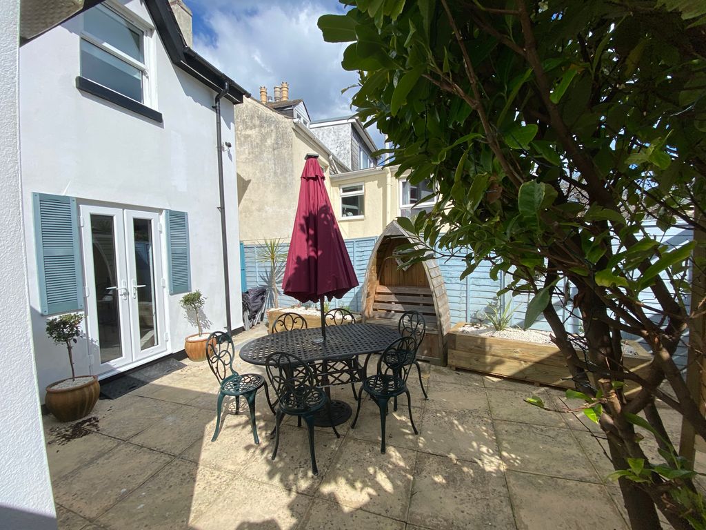 Property photo 2 of 34 Front With Patio