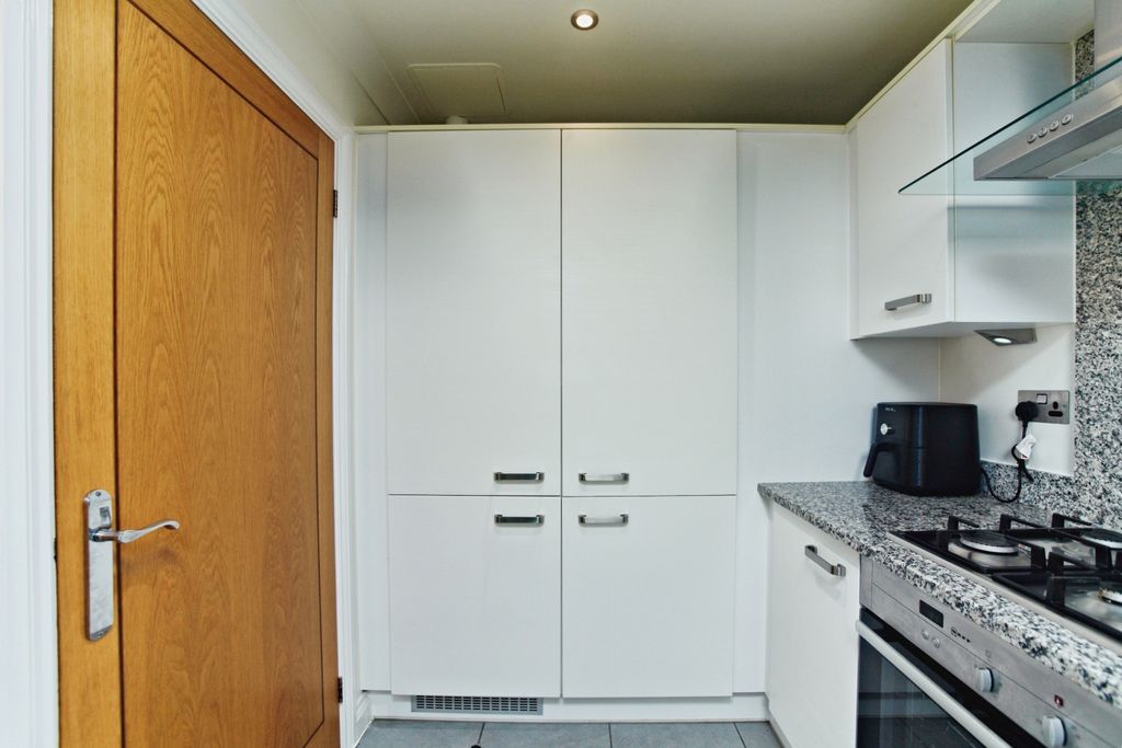 Property photo 3 of 13 Kitchen