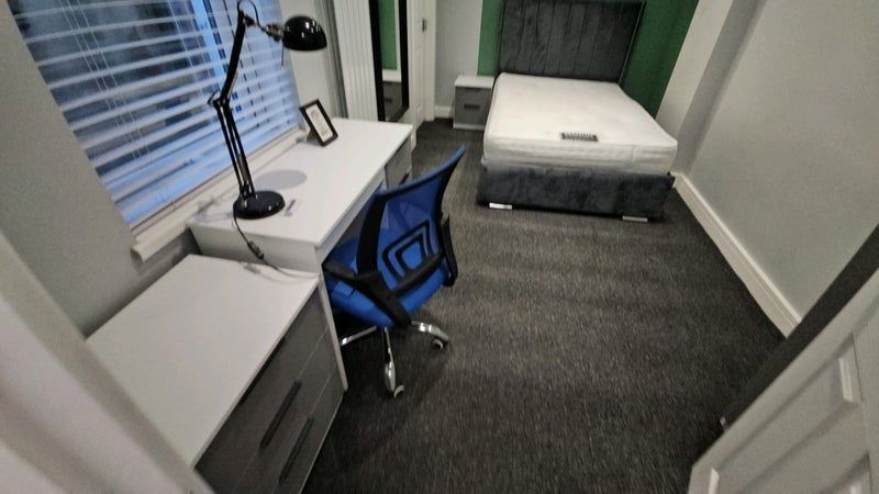 Property photo 1 of 9 A Tidy Single Bedroom Featuring A Comfortable Bed,...