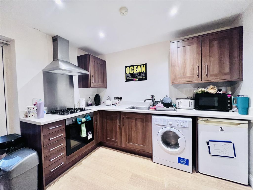 Property photo 2 of 12 Kitchen