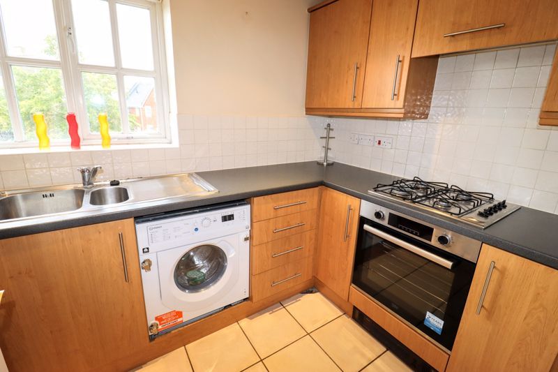 Property photo 3 of 8 Kitchen