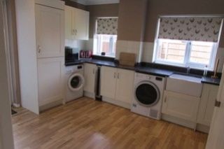 Property photo 2 of 8 Kitchen